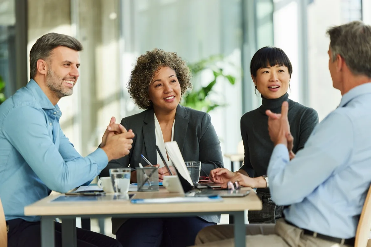 professional-coaching Professionals participating in a group coaching discussion